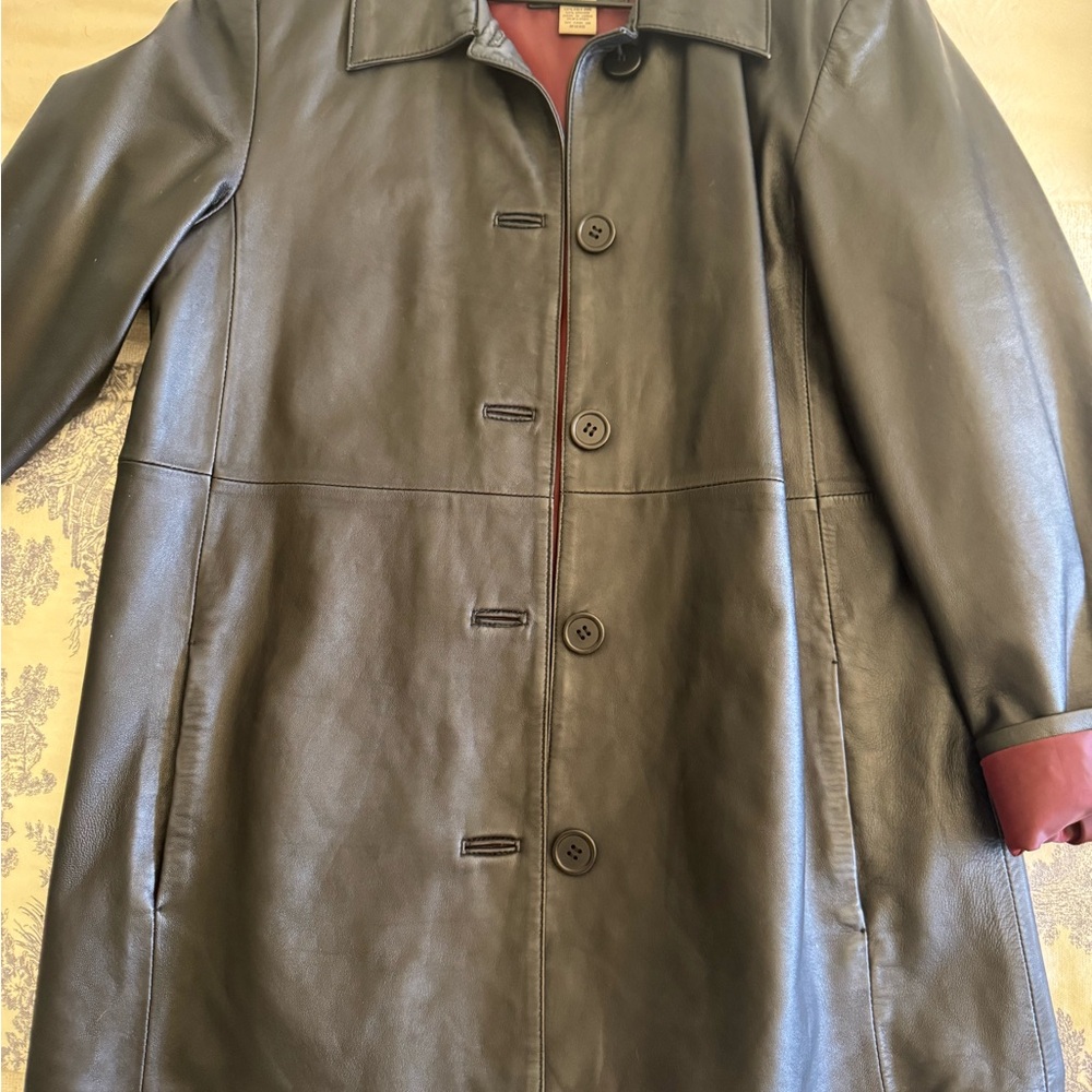 Sleek Black Leather Jacket with Timeless Style and Versatile Design
